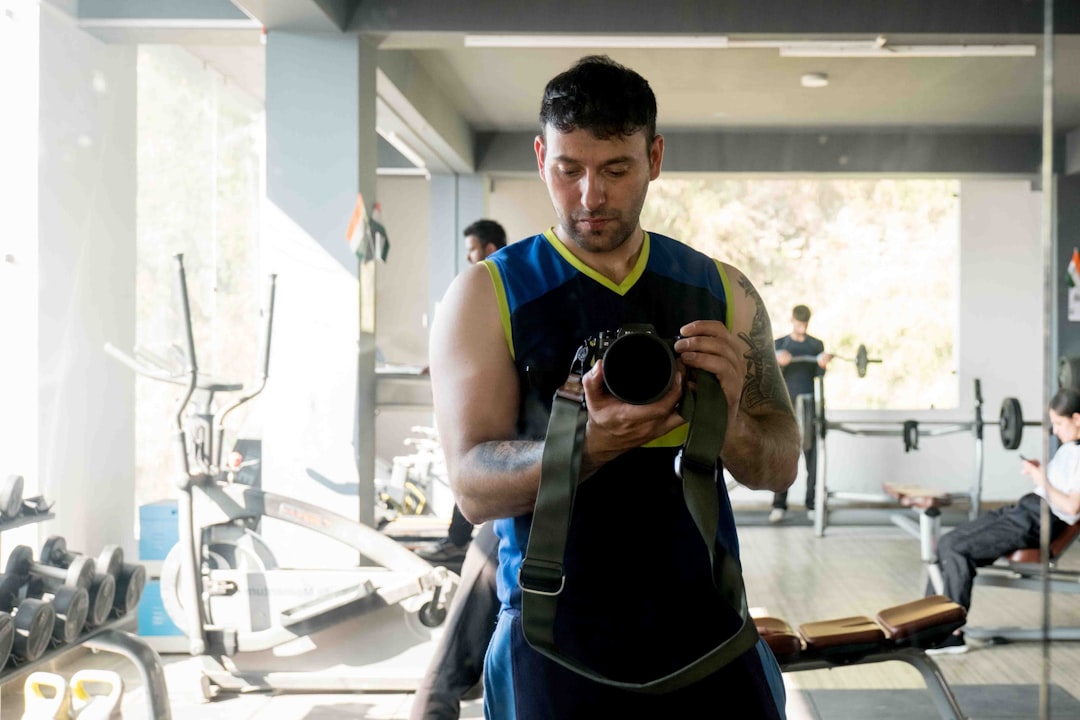 A person wearing a weighted vest while exercising outdoors, showcasing strength training and fitness.